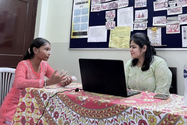 A JKPS student speaking with a counsellor in India