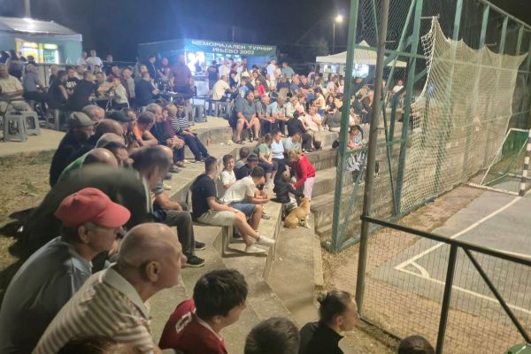 Local community watching football outreach tournament in North Macedonia