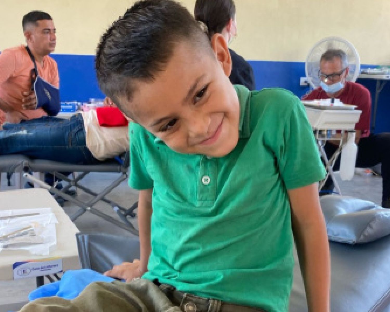 A young boy smiling at the camera 